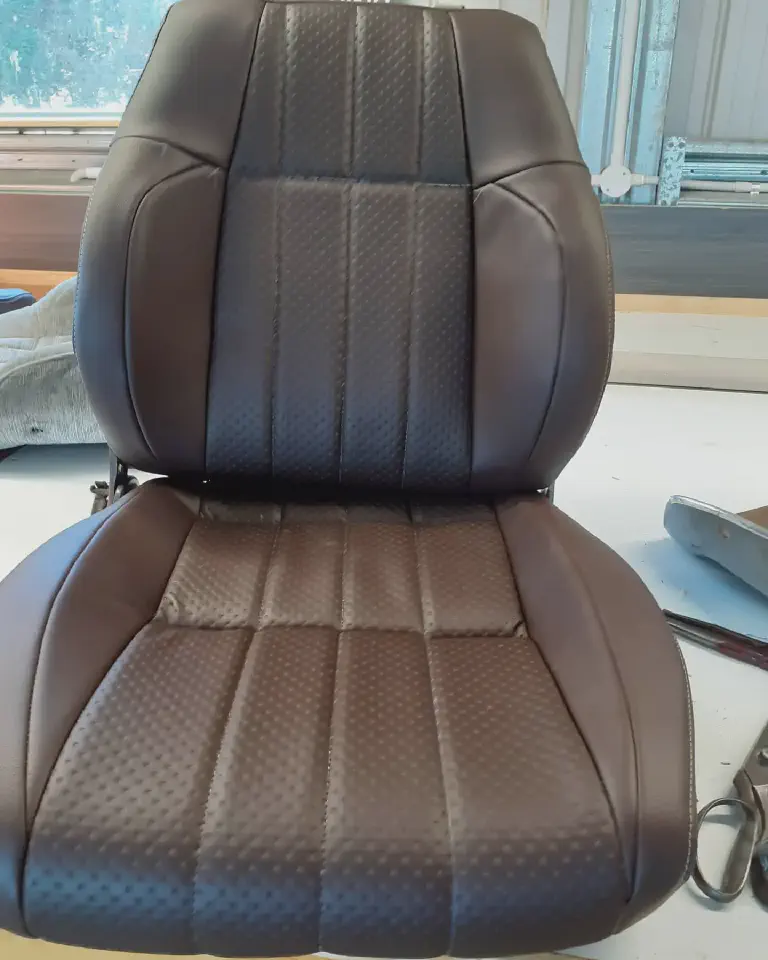 Bucket Seat Retrim - Refreshed car bucket seat with new upholstery