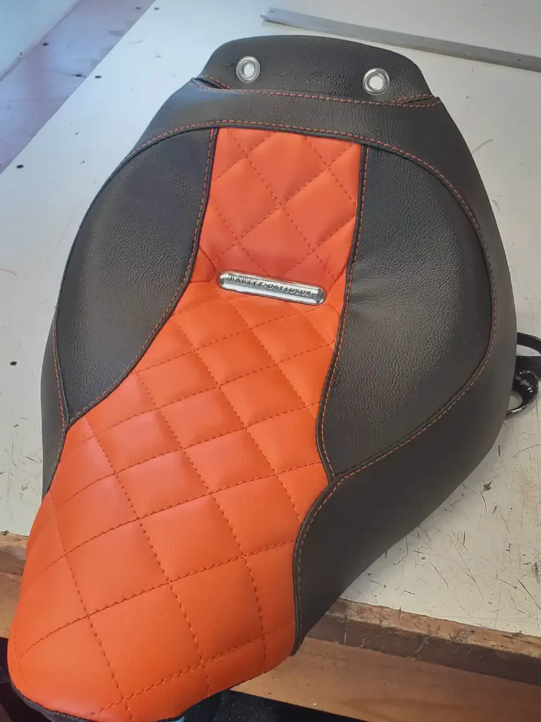 Harley-Davidson Orange Motorcycle Seat - Orange Harley-Davidson seat with badge