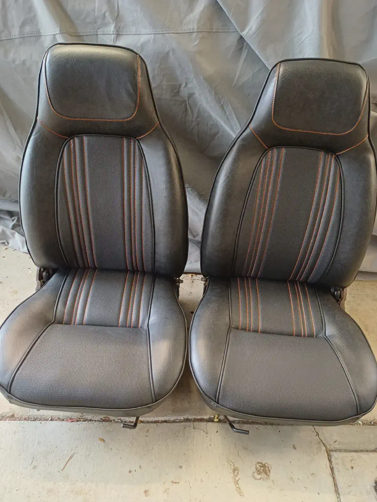 Recovered Toyota Corolla Car Seat - Restored Toyota Corolla car seat w/orange stitching
